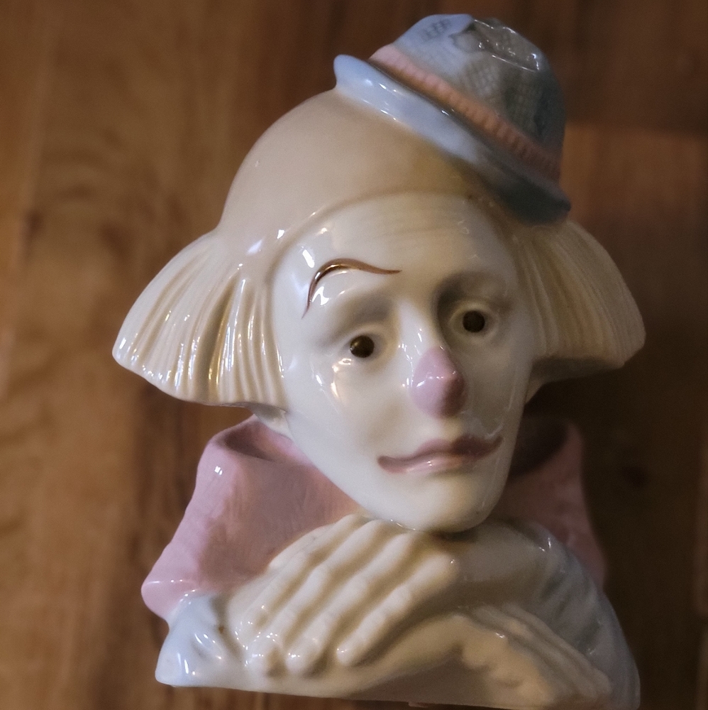 Meico Inc.'s "sad clown"  vintage porcelain figurine